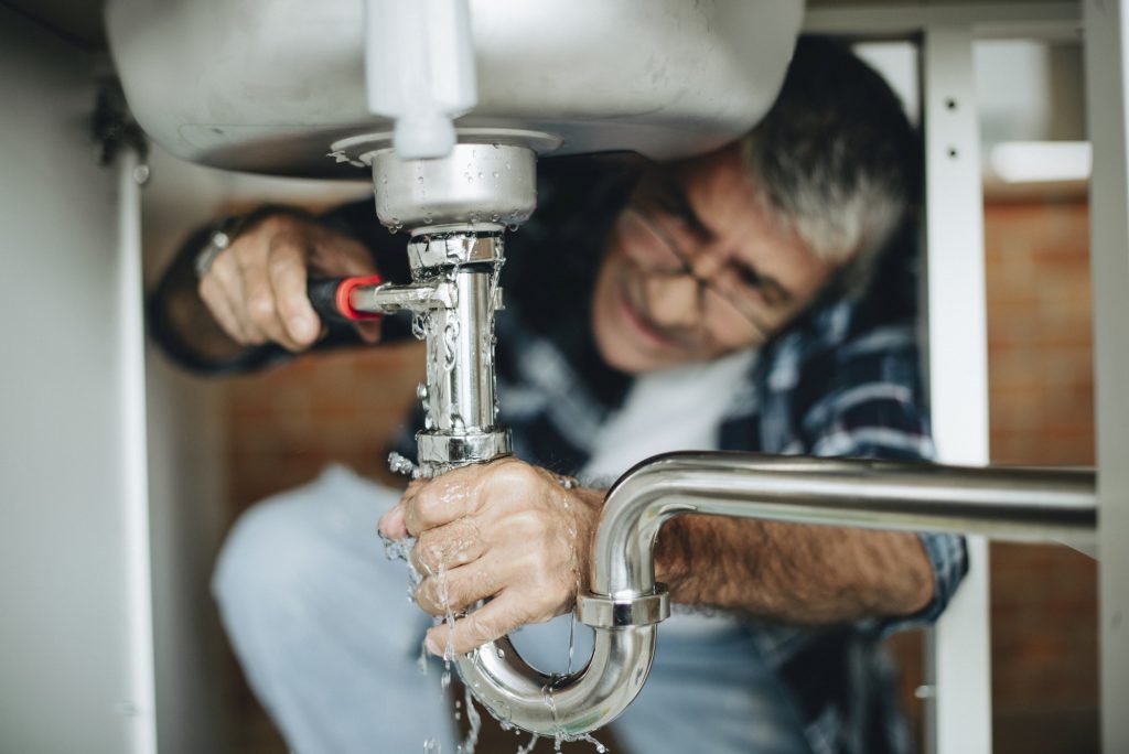 stopping water damage- fixing kitchen sink