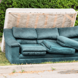 mattress and couch on curb