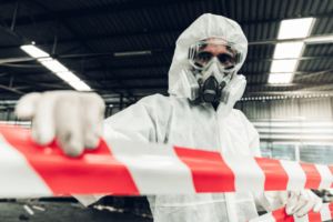 Scientist wear Chemical protection suit check danger chemical